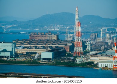 Kitakyushu , Japan April 2 2021 :Scenery of the Dokai Bay factories in the Kitakyushu industrial area of ​​Kitakyushu City, Fukuoka Prefecture