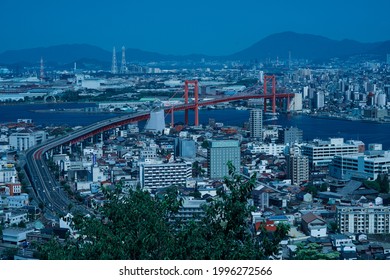Kitakyushu , Japan August 21 2019 : Wakato Ohashi, a unique red bridge in Kitakyushu