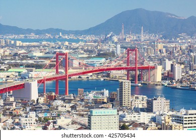KITAKYUSHU, JAPAN - FEB 10: View of Kitakyushu City with Wakato Bridge on Feb 10, 2016 in Kitakyushu, Japan. With 960,000 inhabitants Kitakyushu is the second largest city in Kyushu.