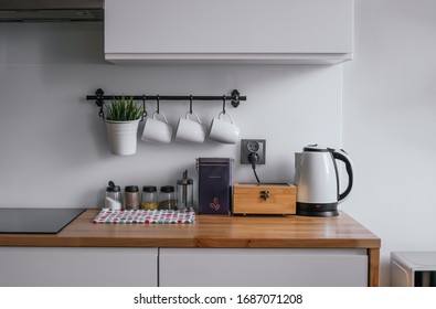 Kitchen Accessories Like Kettle, Coffee Pot, Cups, Napkin, Tea, Coffee And Condiments