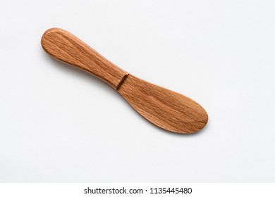 Kitchen accessories. Wooden knife isolated on white background.
