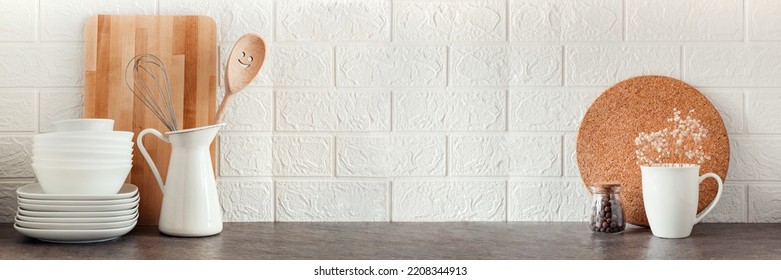 Kitchen background mockup with  cooking  utensils on the table on white background. Blank space for a text, home kitchen decor concept. Wide banner. - Shutterstock ID 2208344913