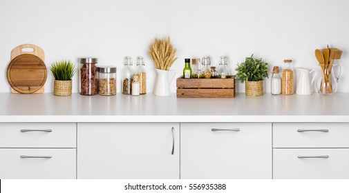 Kitchen Bench Shelf With Various Herbs, Spices, Utensils On White