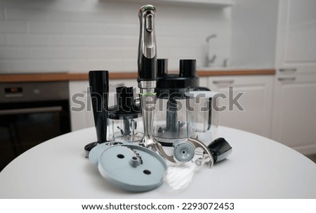 Kitchen blender with attachments and food processor.