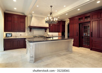 Kitchen With Cherry Wood Cabinetry