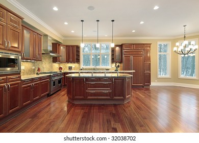 Kitchen With Cherry Wood Cabinetry
