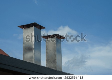 Kitchen chimney with blue sky background.For graphic design,3D rendering and banner background
