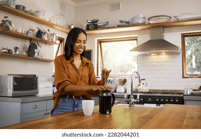 Kitchen, coffee and woman with French press for breakfast latte, cappuccino and hot beverage at home. Relax, morning routine and happy girl make espresso, caffeine drink and brewing in apartment - Powered by Shutterstock