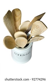 Kitchen Cooking Utensils; Wooden Spatulas Etc In China Storage Pot; Isolated On White Ground; Shot From Above With Heightened Perspective