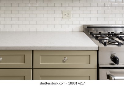 Kitchen Counter with Subway Tile, Stainless Steel oven stove, Shaker Cabinets