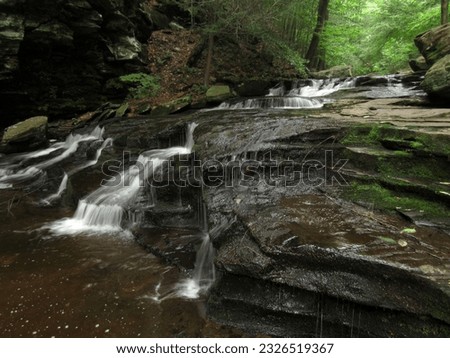 Kitchen Creek spills over small cascades in Ricketts Glen State Park in Benton, Pennsylvania.