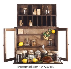 Kitchen Cupboard With Doors Open, Full Of Cans And Products