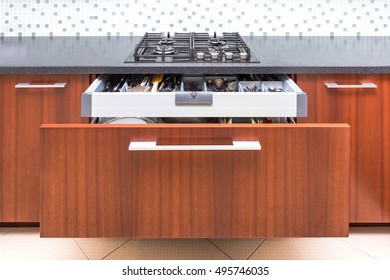 Kitchen cupboard with opened drawer and inner drawer inside