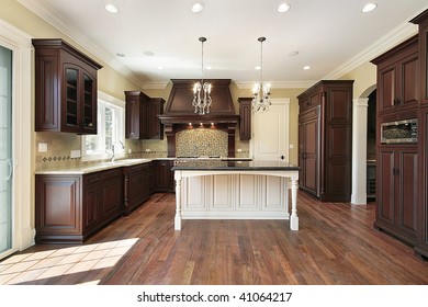 Kitchen With Dark Wood Cabinetry