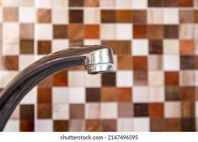 Kitchen Faucet. Closeup Photo Of Metal Faucet. Drought Concept Photo.