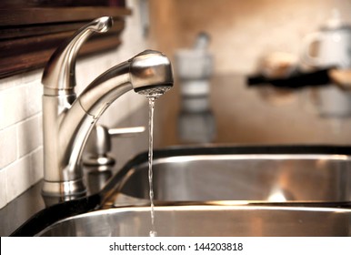 Kitchen Faucet With A Flowing Water