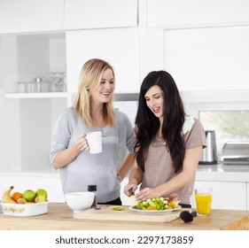 Kitchen, friends and vegan women with salad for healthy eating, meal and lunch together at home. Food, nutrition and happy female people smile with drink and vegetables for diet, wellness and detox - Shutterstock ID 2297173859