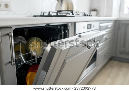 Kitchen furniture with built-in appliances: dishwasher, hob and oven