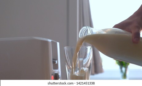 In The Kitchen, A Guy (girl) Pulls Out Food From The Refrigerator And Prepares Breakfast Next To The Toaster, Ready-made Toasters Are Pulled Out. Concept Of: Homemade Food, Comfort, Breakfast, Slow Mo