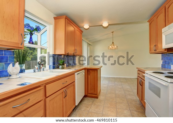 Kitchen Interior Maple Cabinets Blue Tile Stock Photo Edit Now