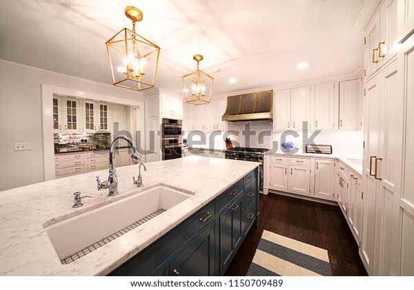 Kitchen Interior with in New Luxury Home.\
Features Elegant Pendant Light\
Fixtures