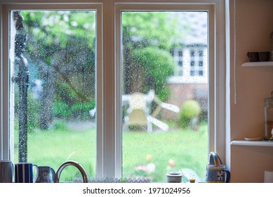 Kitchen Interior View On A Rainy Day Looking Through Window