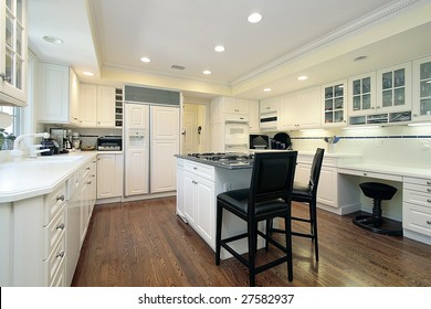 Kitchen with island and chairs - Shutterstock ID 27582937
