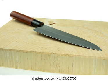 Kitchen Knife And Wood Butcher Block Countertop On White Background