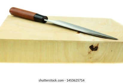 Kitchen Knife And Wood Butcher Block Countertop On White Background