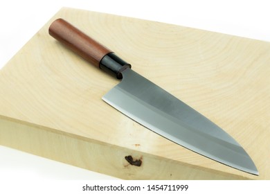 Kitchen Knife And Wood Butcher Block Countertop On White Background