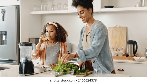 Kitchen, mother and girl with juice, cooking and bonding for breakfast, smile and love for daughter. Home, woman and teaching of meal prep to child, care and relax in apartment, together and happy - Powered by Shutterstock