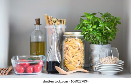 Kitchen pantry with italian food products. Healthy food concept.