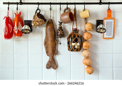 Kitchen, Part Of The Fragment, Interior, Wall, Rilling, Mugs, Bundle Of Onions, Pot Holders