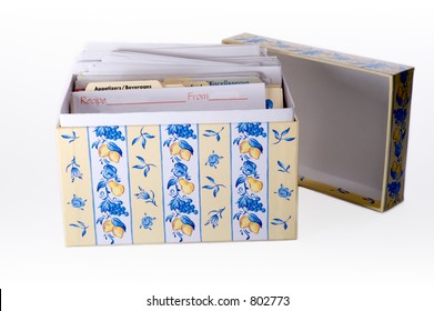 A kitchen recipe box filled with family recipes.