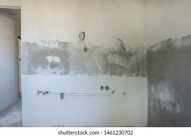 Kitchen Reconstruction. New Wall Plaster And Plumbing