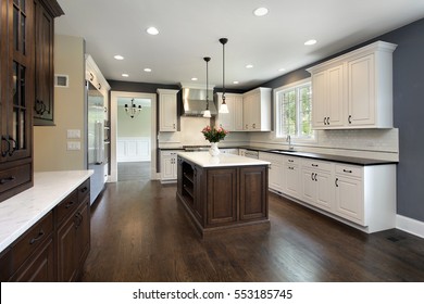 Kitchen in remodeled home with center island.
