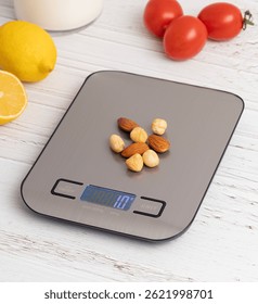 Kitchen scale, precision gray colored kitchen scale taken from different angles