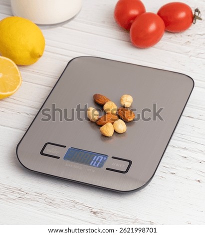 Kitchen scale, precision gray colored kitchen scale taken from different angles