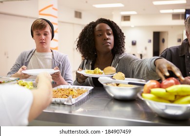 Kitchen Serving Food In Homeless Shelter