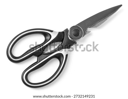 Kitchen shears featuring sharp stainless steel blades and black and white handles for household use