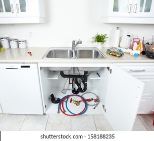 Kitchen Sink Pipes And Drain. Plumbing Service.