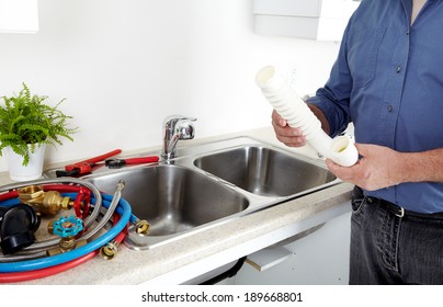 Kitchen Sink Pipes And Drain. Plumbing Service.