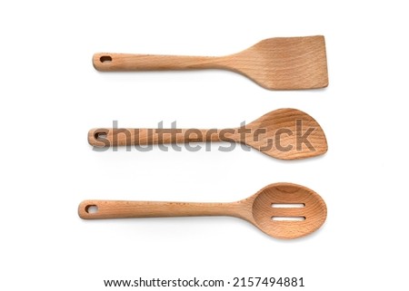 Kitchen Spoon Stirrer, Spatula, Slotted Spoon utensil made of bamboo Wood on white background, top view Сток-фото © 