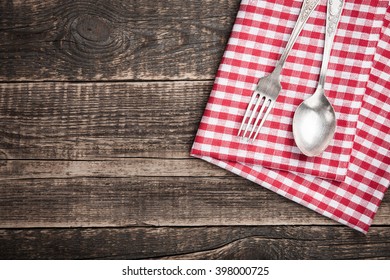 Kitchen table with napkin and cutlery - Powered by Shutterstock