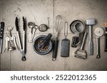 Kitchen utensils or cooking tools on gray background, top view, flat lay. Kitchenware collection with copy space. Cooking background.