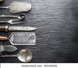 Kitchen utensils on the graphite background. - Powered by Shutterstock