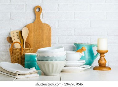 Kitchen utensils on the white table. Kitchen still life. - Shutterstock ID 1347787046