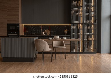 Kitchen Veiw Of A Chic Modern Design Of A Dark Expensive Interior Of A Luxurious Country House With Huge Panoramic Windows And A Magnificent View Of The Divine Forest