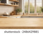 Kitchen wood table top for product display with blurred modern interior. Wooden tabletop over defocused kitchen background. kitchen furniture and desk space. product promotion in the kitchen
