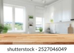 Kitchen wood table top for product display with blurred modern interior. Wooden tabletop over defocused kitchen background. kitchen furniture and desk space. product promotion in the kitchen